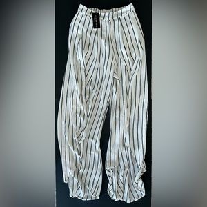 Striped FashionNova beach pants. Black and cream striped